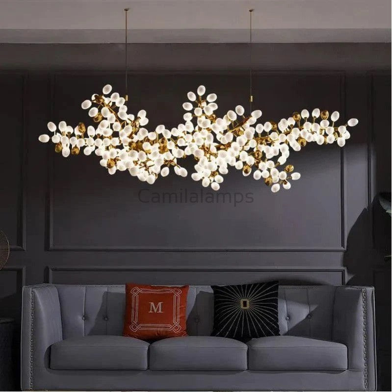 The frame of the branches is handmade and the cups are made of balls in the shape of grapes in milk white and gold. It is an elegant and charming lamp for banquets, living room foyers.