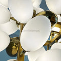 The frame of the branches is handmade and the cups are made of balls in the shape of grapes in milk white and gold. It is an elegant and charming lamp for banquets, living room foyers.